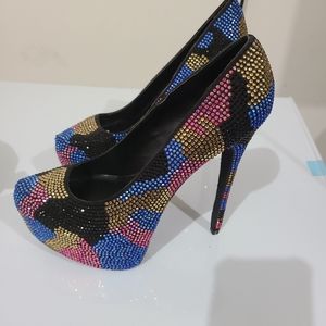 Party girl. Sky high rhinestone pumps